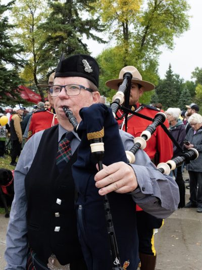 SVJETLANA MLINAREVIC THE CARILLON 

Piper Heather Purvis led the RCMP honour guard of Sgt. Joanne Ryll (left) and Const. Denis Redikop and survivors during the first walk at the start of Southeast Cancer Support Services’ Walk For Hope fundraiser at A.D. Penner Park on Sept. 19. The walk was a way for survivors and their families to show strength and support for each other and support of the organization that provides many services, including transportation to medical appointments for cancer patients.
