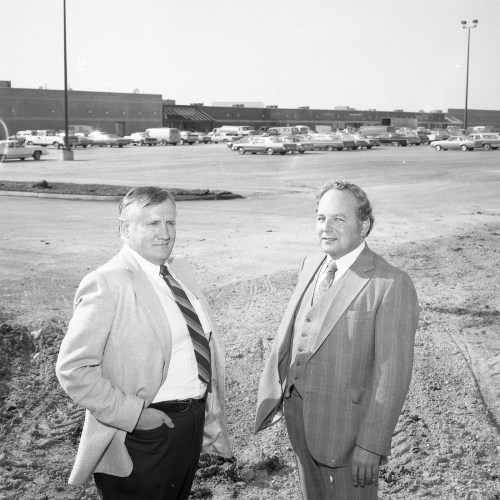 CARILLON ARCHIVES 

Clearspring Village developers Jim Penner and Ernie Penner have good reason to look pleased. If opening day May 7, 1980, is any indication, the complex appears to be a guaranteed success.