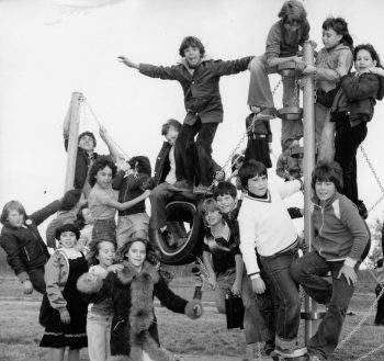 CARILLON ARCHIVES 

Elementary school students enthusiastically climb aboard the tire jungle, which is part of a second new playground at the Richer school.