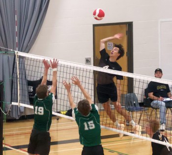 Leif Reimer flies for a hit during South Central Athletic Conference action. (Cassidy Dankochik The Carillon)