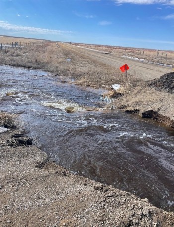 WES ANDERSON
Water flows at the corner of Provincial Road 579 and Municipal Road 112 North in the Municipality of Russell Binscarth.
